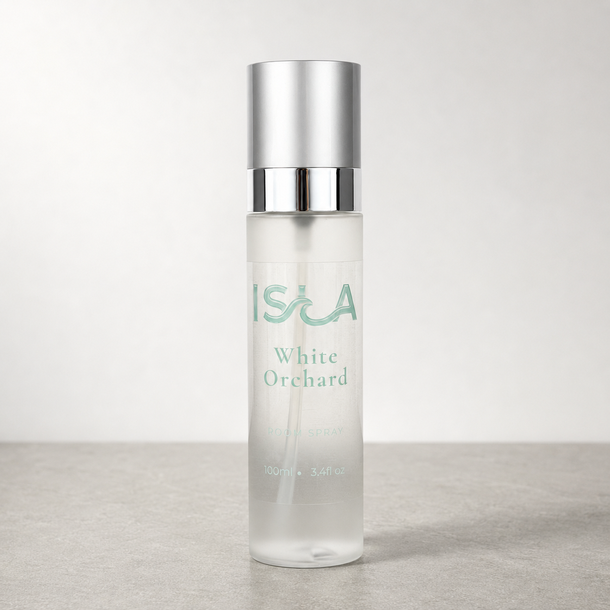 Isla room spray bottle on stone surface